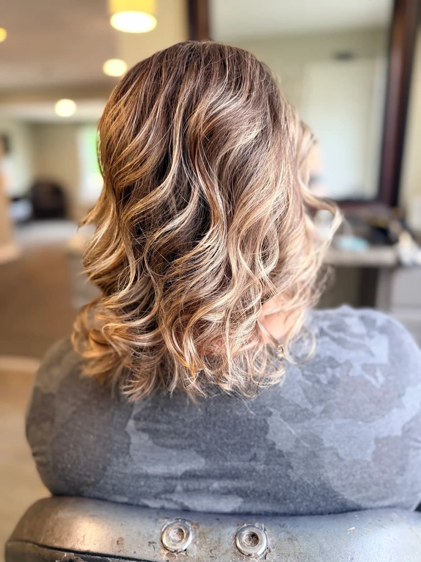 Dimensional curled bob finished at Hair Haven