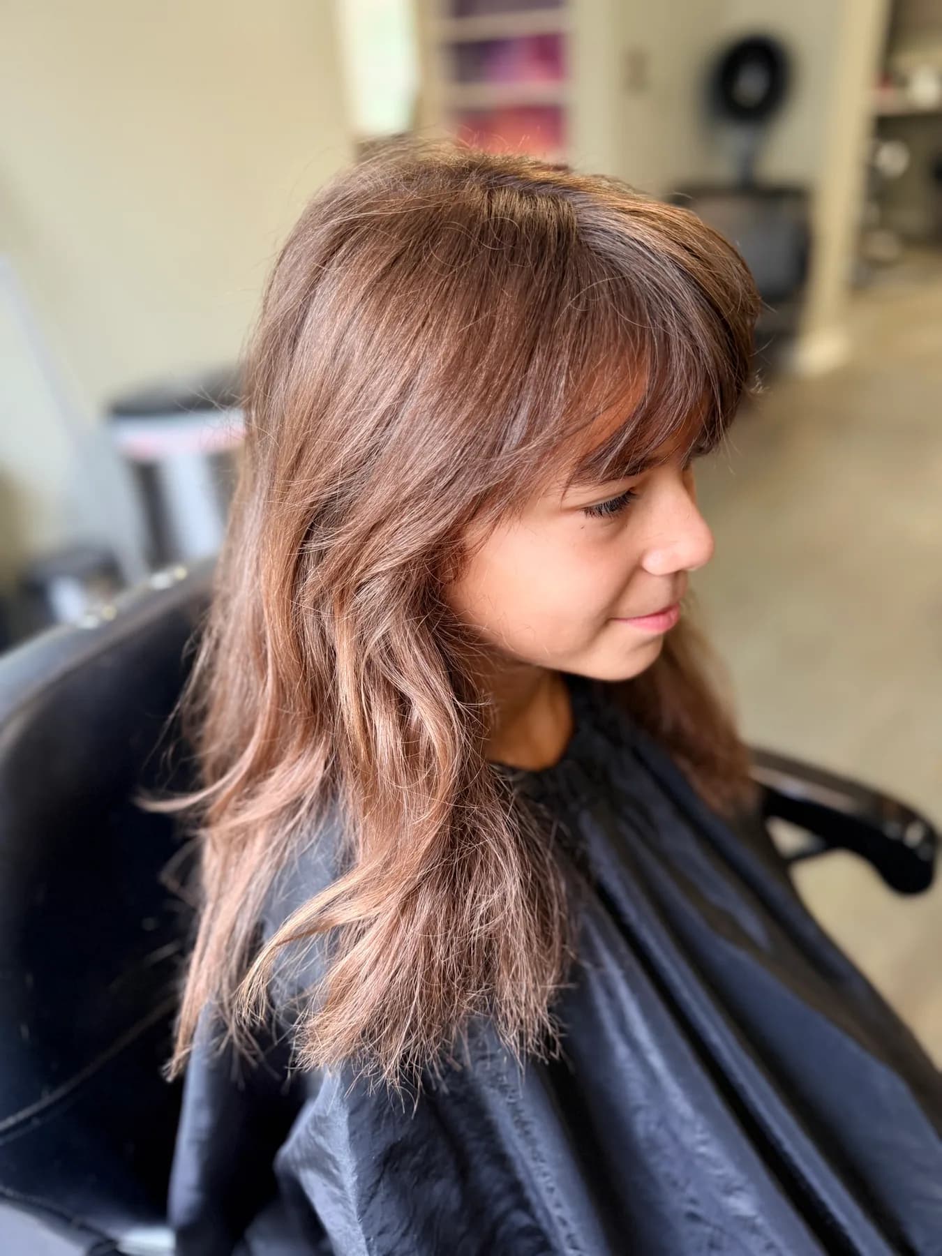 Warm layered haircut finished at Hair Haven