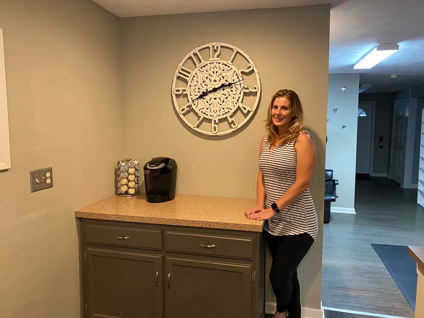 A Hair Haven team member inside the salon
